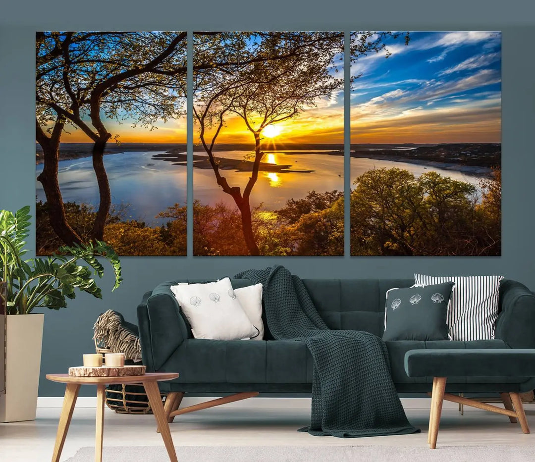 The "Sunset On The Lake Wall Art Canvas Print," featuring a vibrant sunset over a lake, is expertly crafted on museum-quality canvas and comes ready to hang. Its UV-protective coating ensures the colors stay as vivid as when they were first framed.