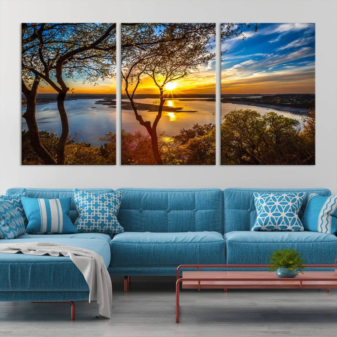 The "Sunset On The Lake Wall Art Canvas Print," featuring a vibrant sunset over a lake, is expertly crafted on museum-quality canvas and comes ready to hang. Its UV-protective coating ensures the colors stay as vivid as when they were first framed.