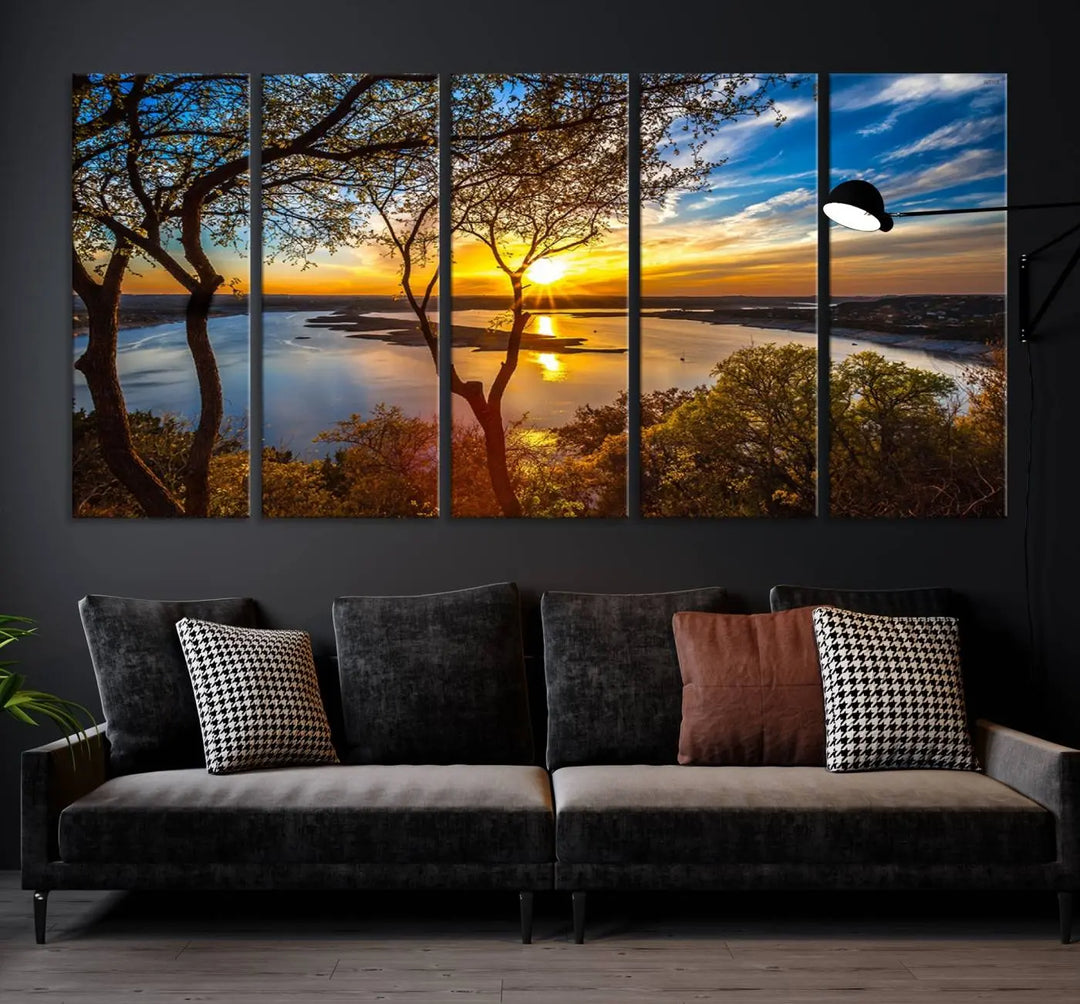 The "Sunset On The Lake Wall Art Canvas Print," featuring a vibrant sunset over a lake, is expertly crafted on museum-quality canvas and comes ready to hang. Its UV-protective coating ensures the colors stay as vivid as when they were first framed.