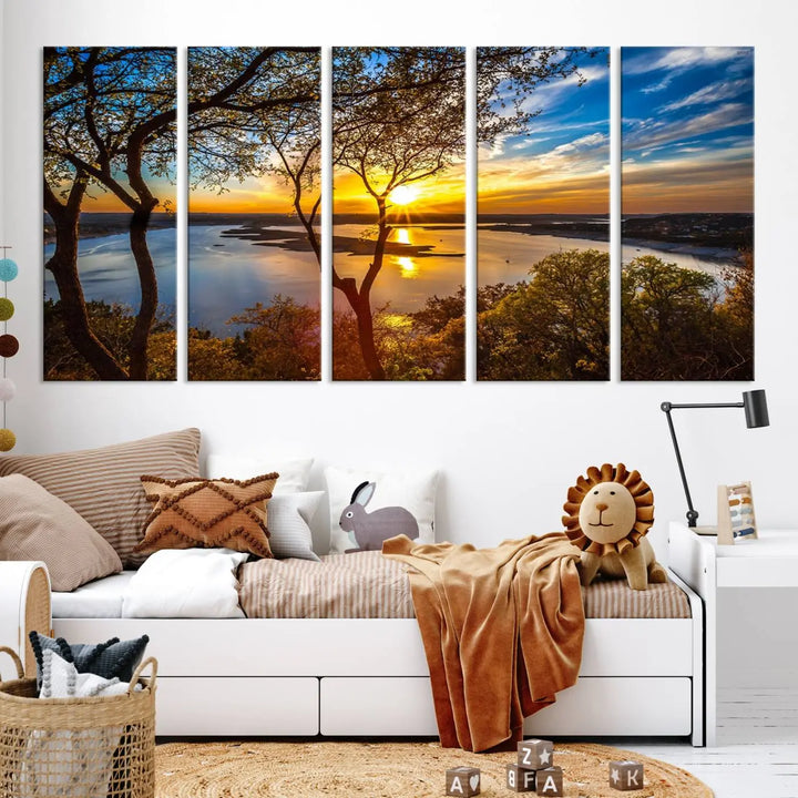 The "Sunset On The Lake Wall Art Canvas Print," featuring a vibrant sunset over a lake, is expertly crafted on museum-quality canvas and comes ready to hang. Its UV-protective coating ensures the colors stay as vivid as when they were first framed.