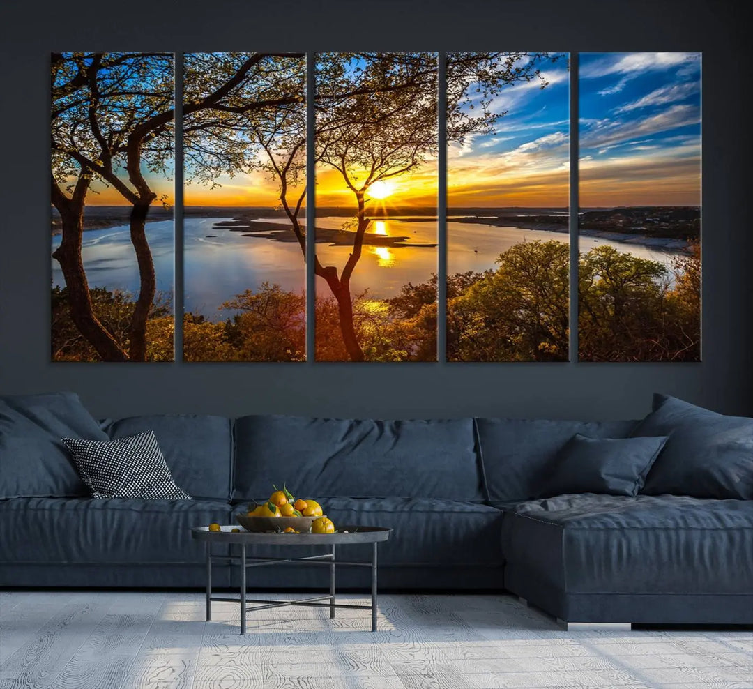 The "Sunset On The Lake Wall Art Canvas Print," featuring a vibrant sunset over a lake, is expertly crafted on museum-quality canvas and comes ready to hang. Its UV-protective coating ensures the colors stay as vivid as when they were first framed.