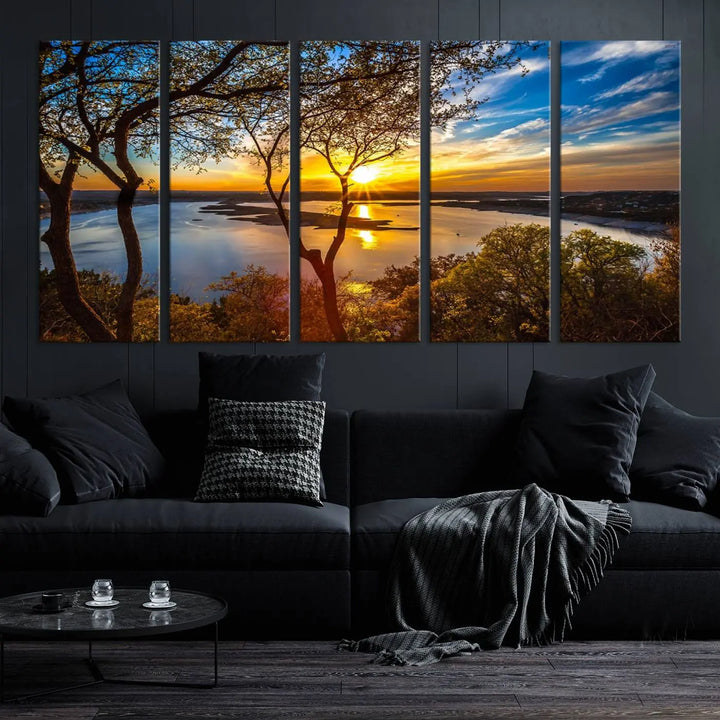 The "Sunset On The Lake Wall Art Canvas Print," featuring a vibrant sunset over a lake, is expertly crafted on museum-quality canvas and comes ready to hang. Its UV-protective coating ensures the colors stay as vivid as when they were first framed.