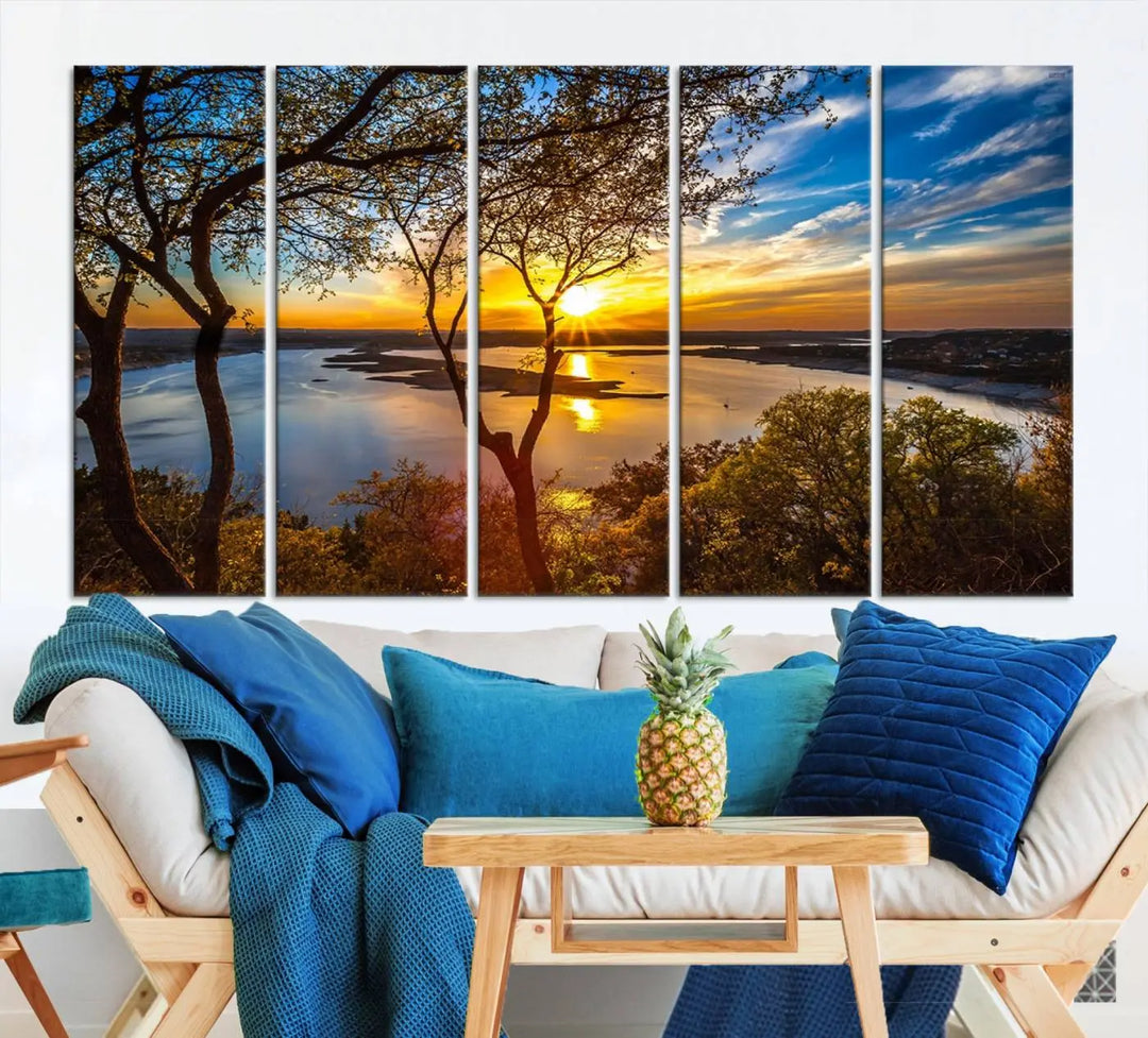 The "Sunset On The Lake Wall Art Canvas Print," featuring a vibrant sunset over a lake, is expertly crafted on museum-quality canvas and comes ready to hang. Its UV-protective coating ensures the colors stay as vivid as when they were first framed.