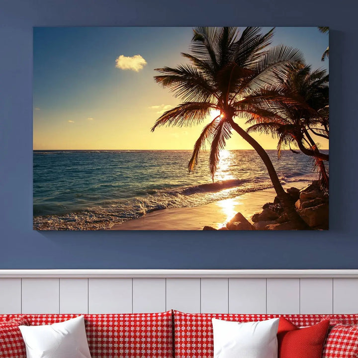 The Sunset Palm Trees Wall Art Canvas Print, a triptych masterpiece depicting a tropical beach sunset with palm trees, is expertly displayed on museum-quality canvases.