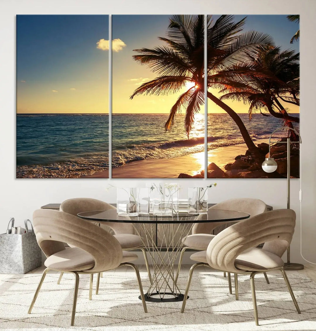 The Sunset Palm Trees Wall Art Canvas Print, a triptych masterpiece depicting a tropical beach sunset with palm trees, is expertly displayed on museum-quality canvases.