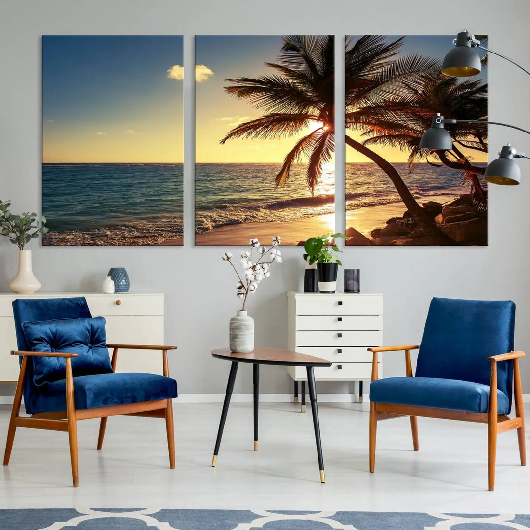 The Sunset Palm Trees Wall Art Canvas Print, a triptych masterpiece depicting a tropical beach sunset with palm trees, is expertly displayed on museum-quality canvases.