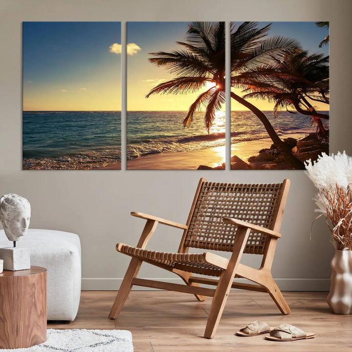 The Sunset Palm Trees Wall Art Canvas Print, a triptych masterpiece depicting a tropical beach sunset with palm trees, is expertly displayed on museum-quality canvases.