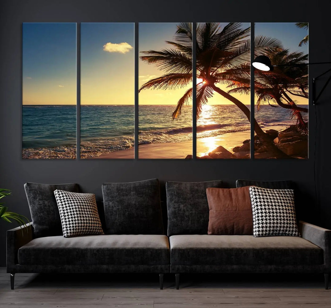 The Sunset Palm Trees Wall Art Canvas Print, a triptych masterpiece depicting a tropical beach sunset with palm trees, is expertly displayed on museum-quality canvases.