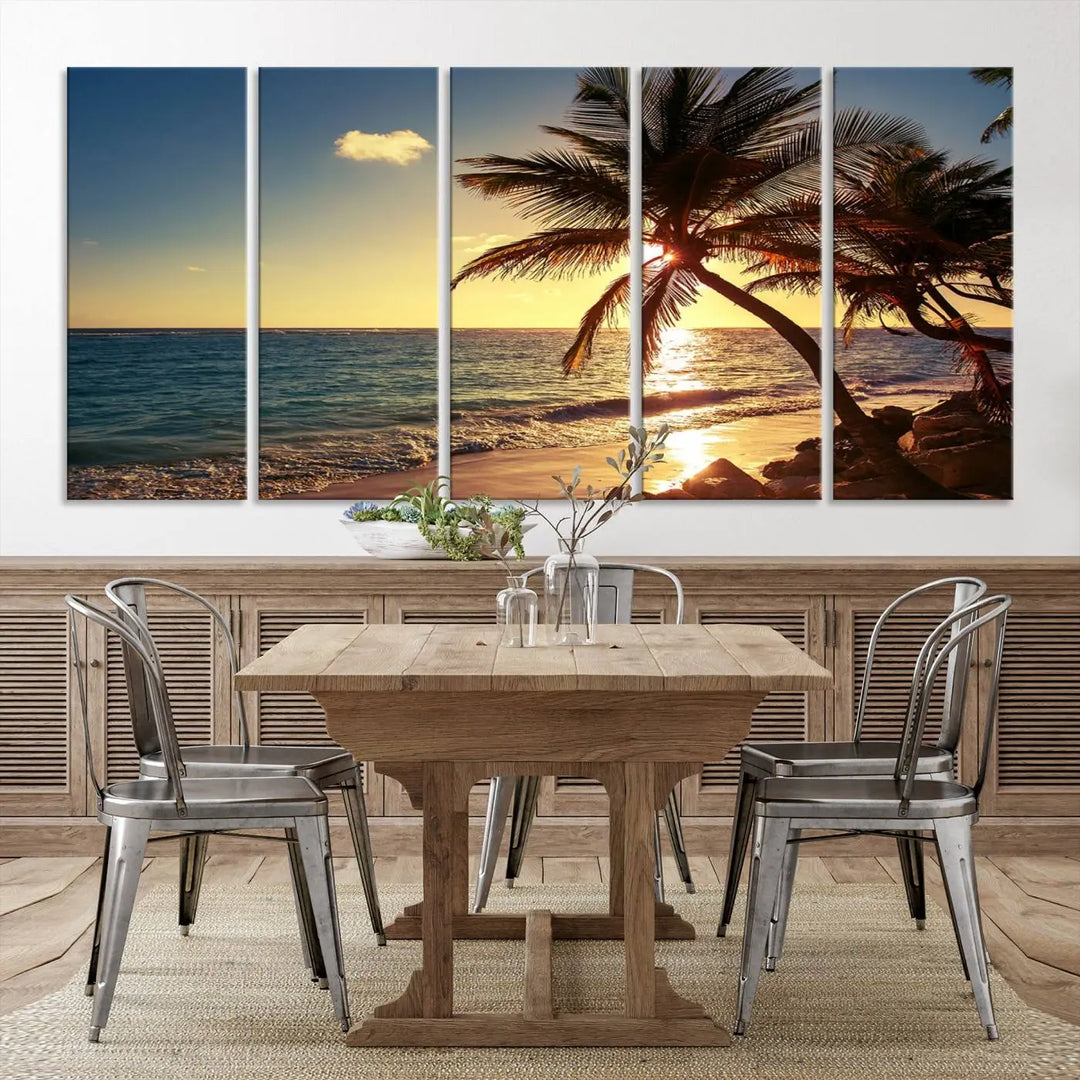 The Sunset Palm Trees Wall Art Canvas Print, a triptych masterpiece depicting a tropical beach sunset with palm trees, is expertly displayed on museum-quality canvases.