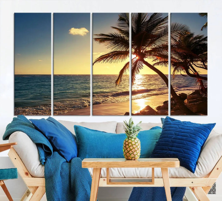 The Sunset Palm Trees Wall Art Canvas Print, a triptych masterpiece depicting a tropical beach sunset with palm trees, is expertly displayed on museum-quality canvases.