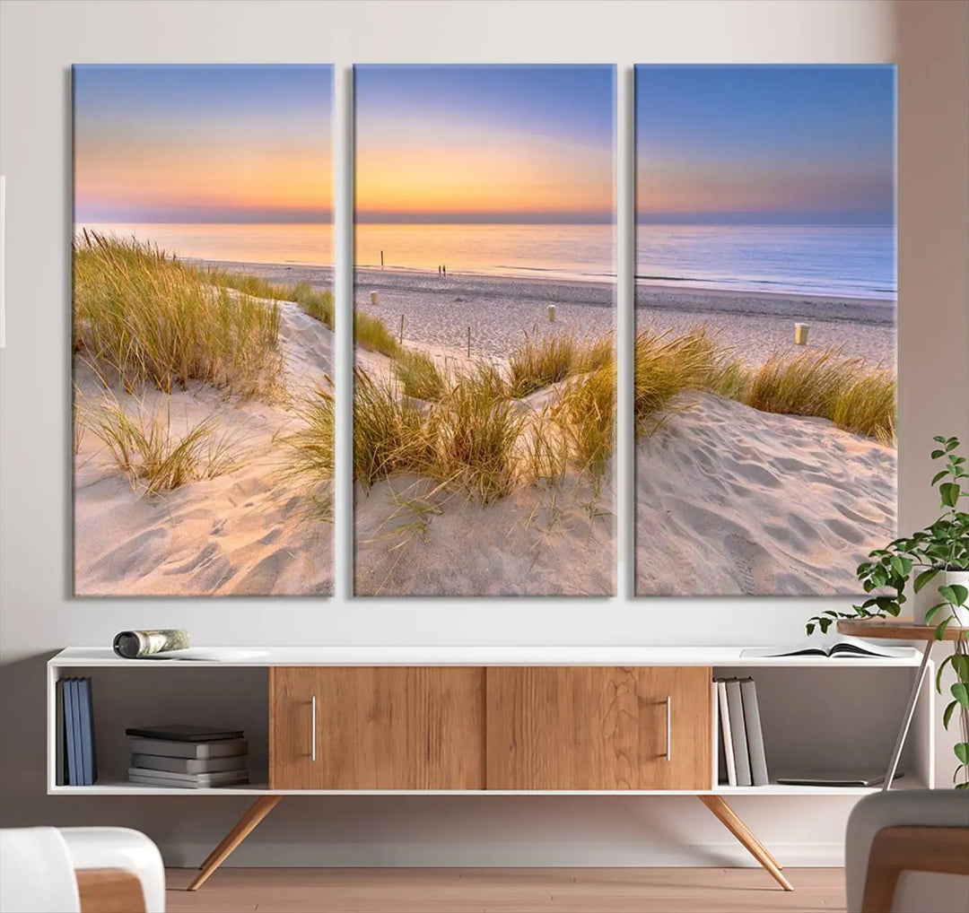 The "Sunset Silence on the Beach" wall art canvas print features a serene beach scene at sunset on museum-quality canvas with a UV-protective coating.