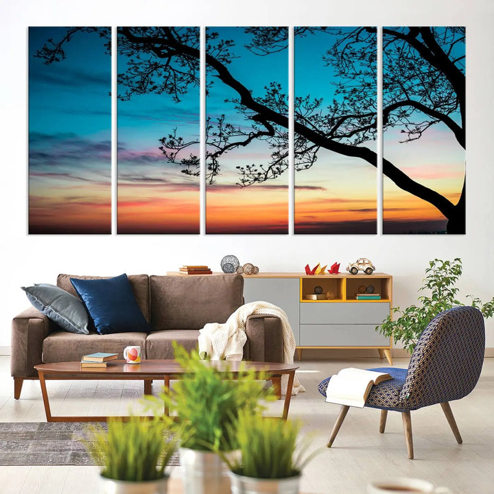 The "Sunset Tree Leaves Wall Art Canvas Print" features a triptych of tree branches against a vibrant sunset sky. Each piece is printed on museum-quality canvas and finished with a UV-protective coating, ensuring it is both stunning and ready to hang.