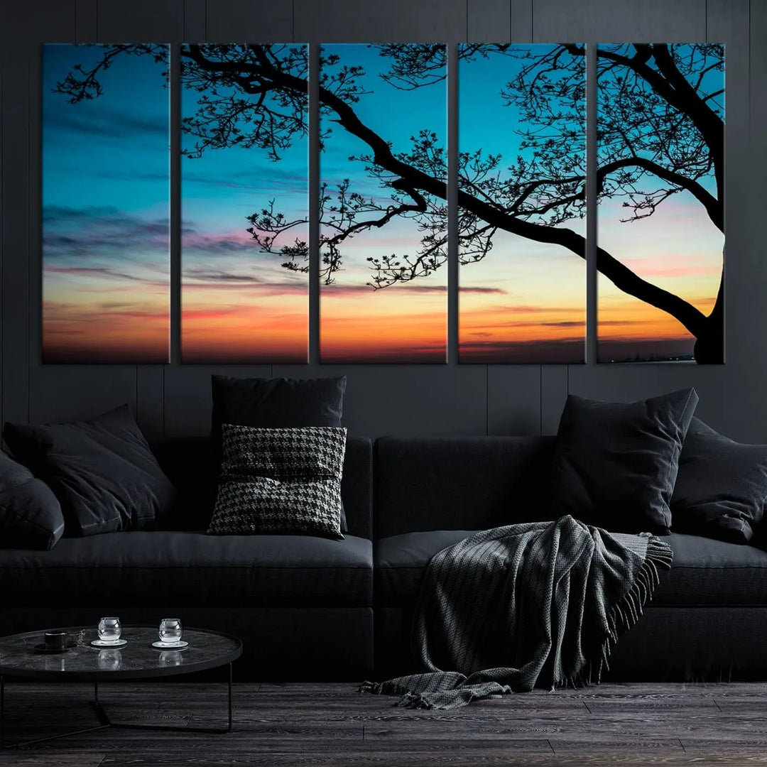 The "Sunset Tree Leaves Wall Art Canvas Print" features a triptych of tree branches against a vibrant sunset sky. Each piece is printed on museum-quality canvas and finished with a UV-protective coating, ensuring it is both stunning and ready to hang.