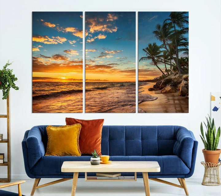 The Sunset Wall Art Canvas Print beautifully enhances the living room. This tropical triptych, crafted on museum-quality canvas, depicts a sunset with palm trees and adds a touch of paradise to the space. Enjoy the charm of hand-assembled frames with free shipping included.