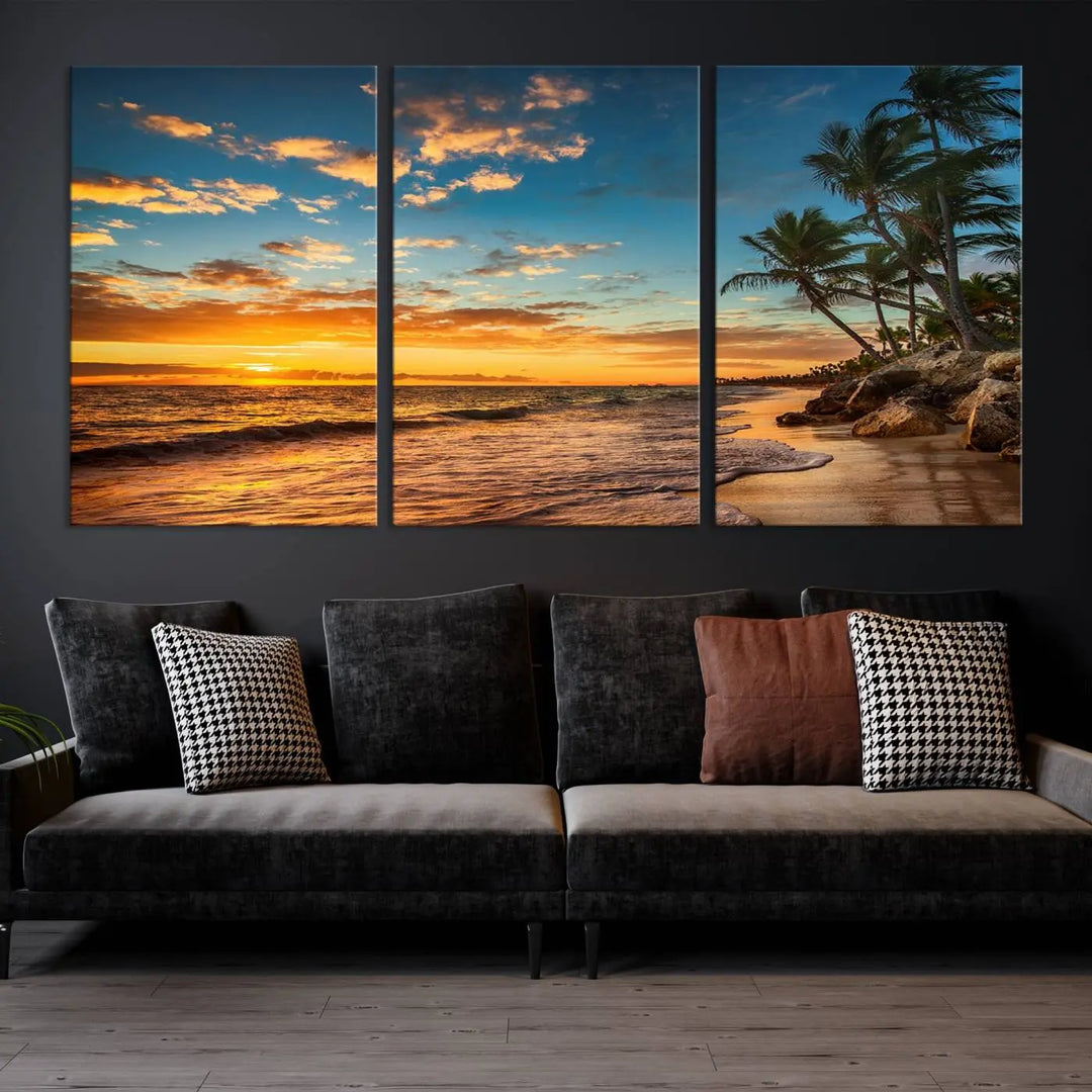 The Sunset Wall Art Canvas Print beautifully enhances the living room. This tropical triptych, crafted on museum-quality canvas, depicts a sunset with palm trees and adds a touch of paradise to the space. Enjoy the charm of hand-assembled frames with free shipping included.