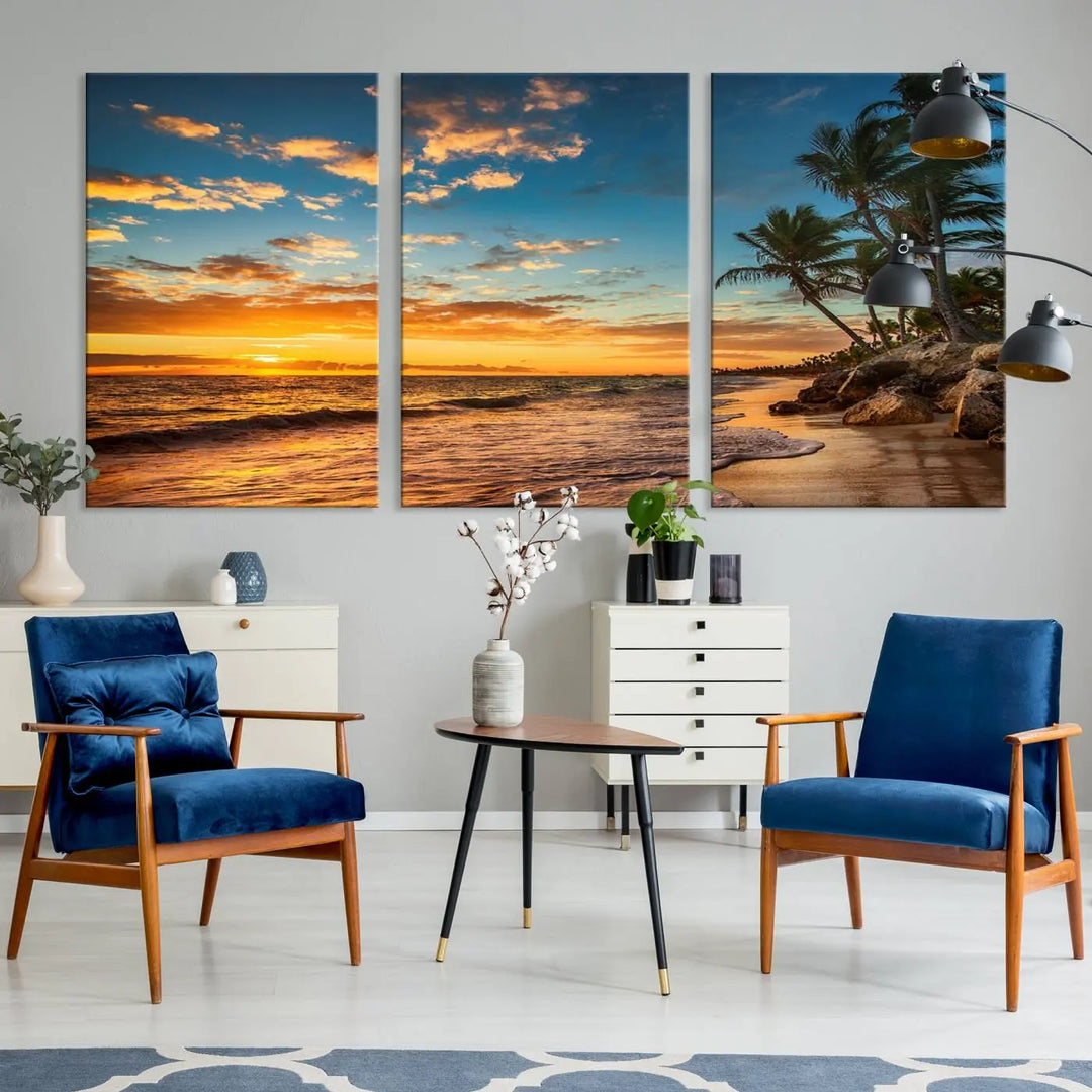 The Sunset Wall Art Canvas Print beautifully enhances the living room. This tropical triptych, crafted on museum-quality canvas, depicts a sunset with palm trees and adds a touch of paradise to the space. Enjoy the charm of hand-assembled frames with free shipping included.