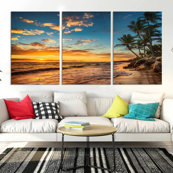 The Sunset Wall Art Canvas Print beautifully enhances the living room. This tropical triptych, crafted on museum-quality canvas, depicts a sunset with palm trees and adds a touch of paradise to the space. Enjoy the charm of hand-assembled frames with free shipping included.