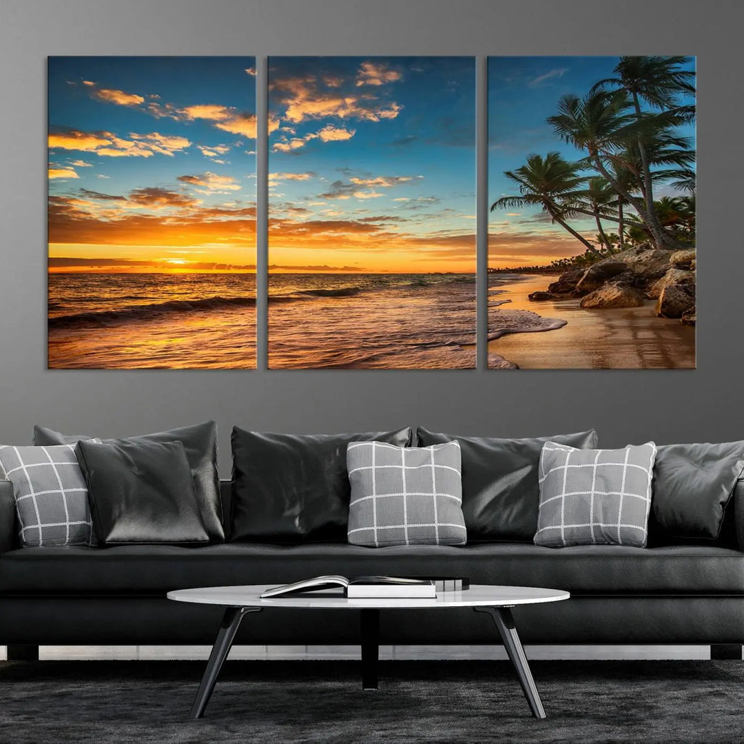 The Sunset Wall Art Canvas Print beautifully enhances the living room. This tropical triptych, crafted on museum-quality canvas, depicts a sunset with palm trees and adds a touch of paradise to the space. Enjoy the charm of hand-assembled frames with free shipping included.