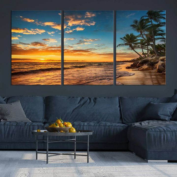 The Sunset Wall Art Canvas Print beautifully enhances the living room. This tropical triptych, crafted on museum-quality canvas, depicts a sunset with palm trees and adds a touch of paradise to the space. Enjoy the charm of hand-assembled frames with free shipping included.