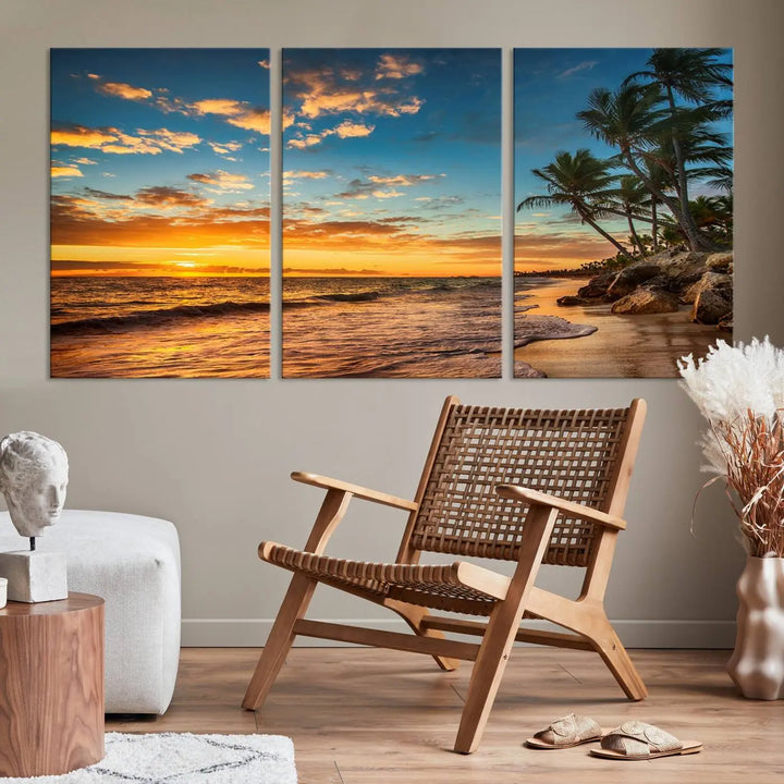 The Sunset Wall Art Canvas Print beautifully enhances the living room. This tropical triptych, crafted on museum-quality canvas, depicts a sunset with palm trees and adds a touch of paradise to the space. Enjoy the charm of hand-assembled frames with free shipping included.