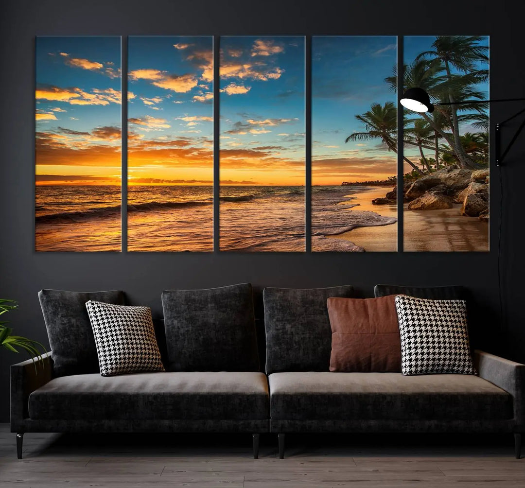 The Sunset Wall Art Canvas Print beautifully enhances the living room. This tropical triptych, crafted on museum-quality canvas, depicts a sunset with palm trees and adds a touch of paradise to the space. Enjoy the charm of hand-assembled frames with free shipping included.