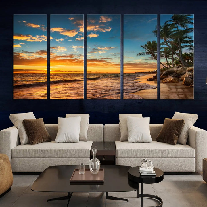 The Sunset Wall Art Canvas Print beautifully enhances the living room. This tropical triptych, crafted on museum-quality canvas, depicts a sunset with palm trees and adds a touch of paradise to the space. Enjoy the charm of hand-assembled frames with free shipping included.