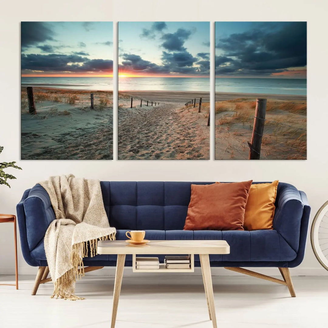 The living room features a Sunset and Beach Wall Art Canvas Print.