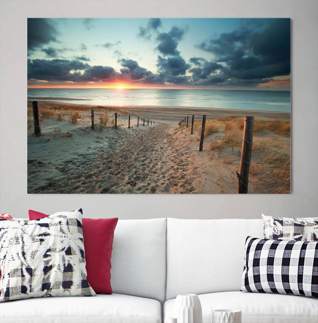 The living room features a Sunset and Beach Wall Art Canvas Print.