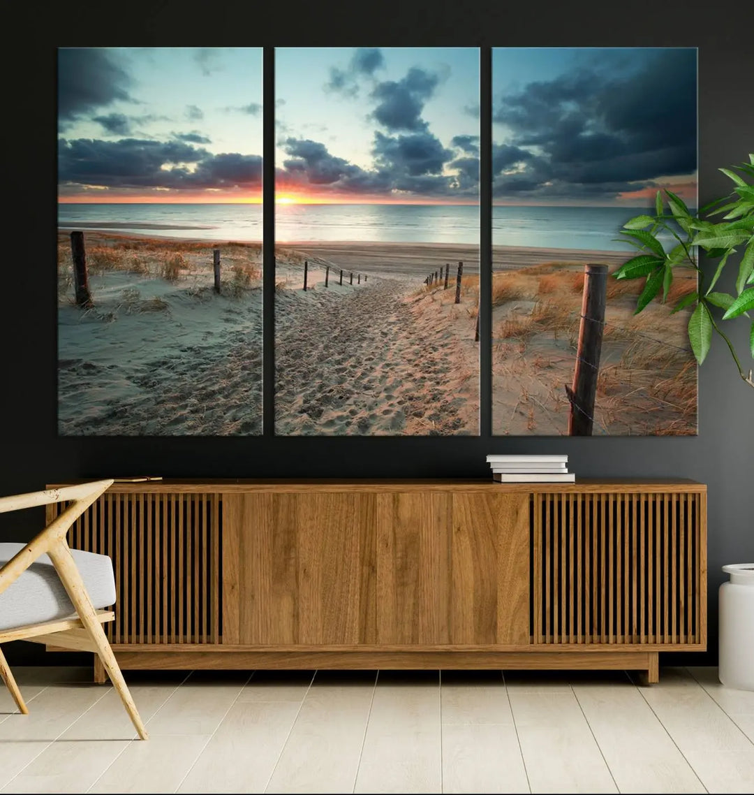 The living room features a Sunset and Beach Wall Art Canvas Print.