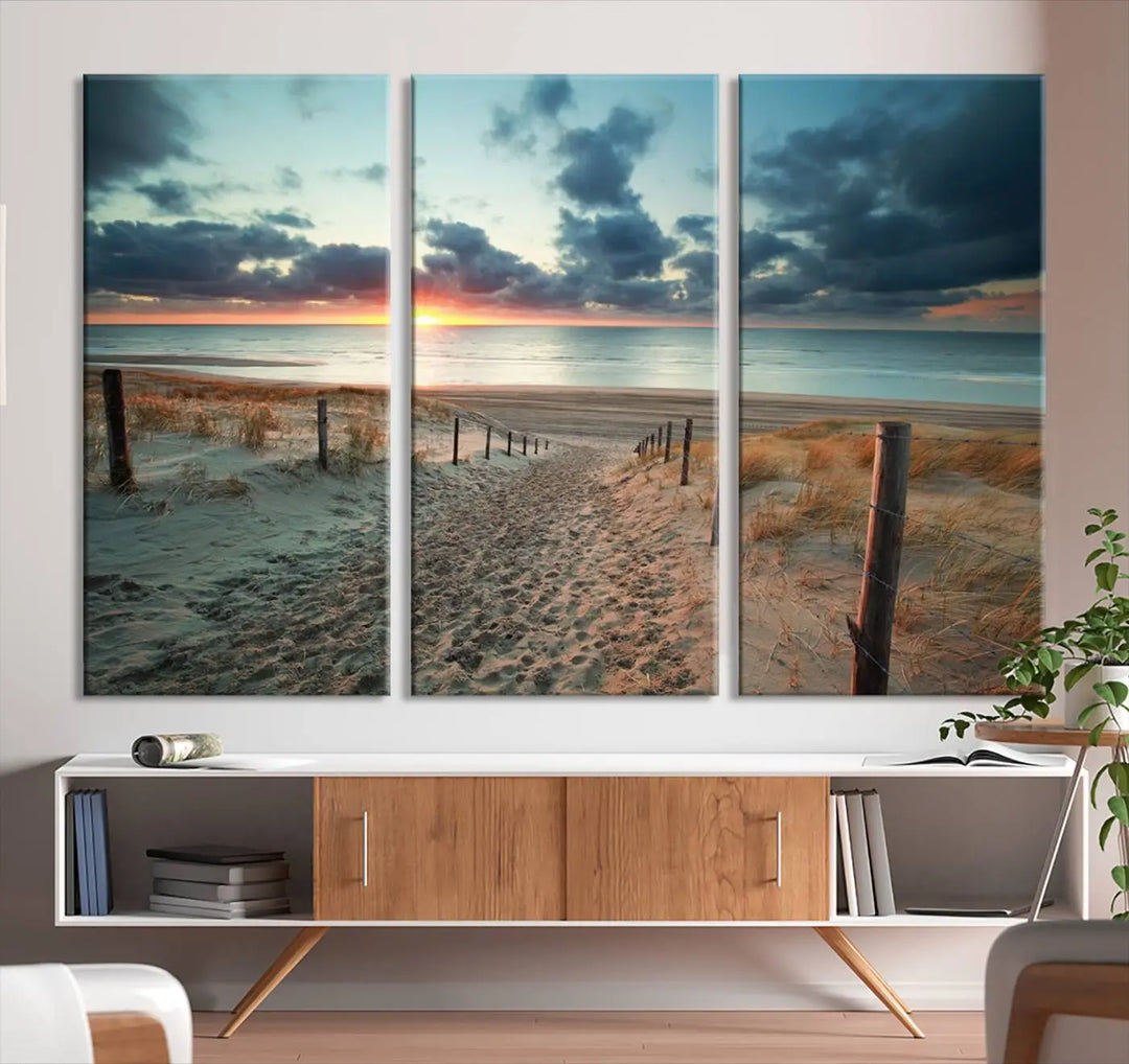 The living room features a Sunset and Beach Wall Art Canvas Print.