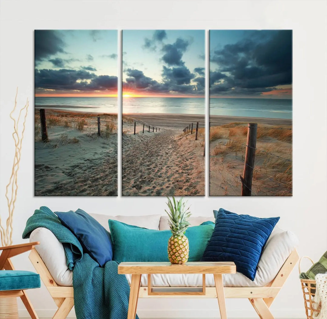 The living room features a Sunset and Beach Wall Art Canvas Print.