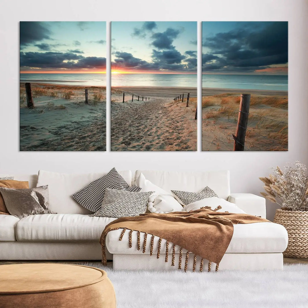 The living room features a Sunset and Beach Wall Art Canvas Print.