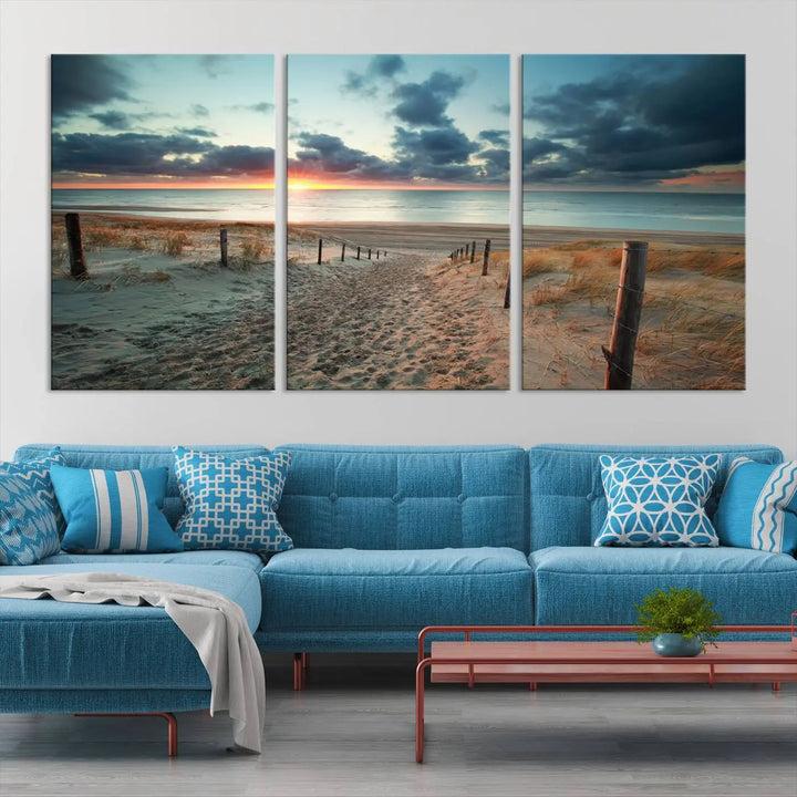 The living room features a Sunset and Beach Wall Art Canvas Print.