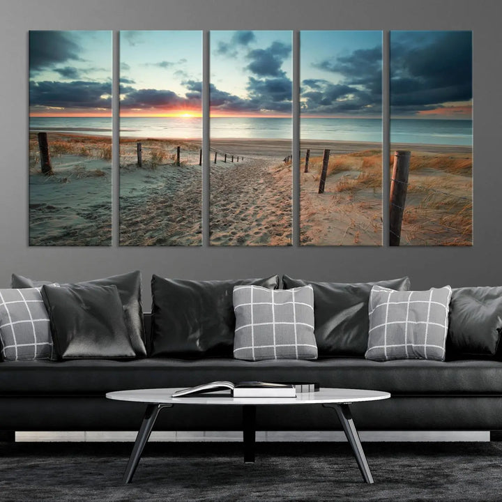 The living room features a Sunset and Beach Wall Art Canvas Print.