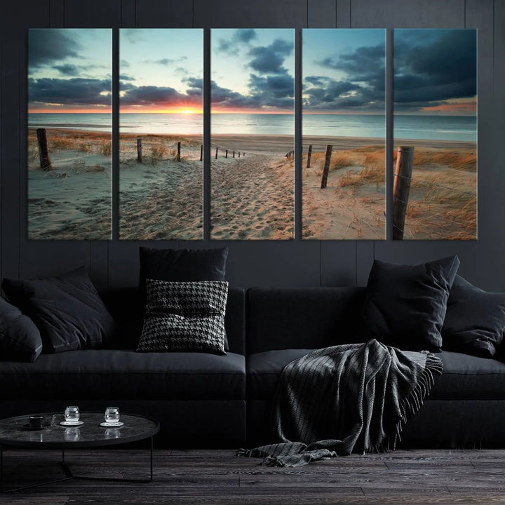 The living room features a Sunset and Beach Wall Art Canvas Print.