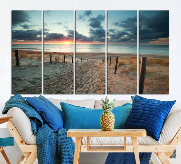 The living room features a Sunset and Beach Wall Art Canvas Print.