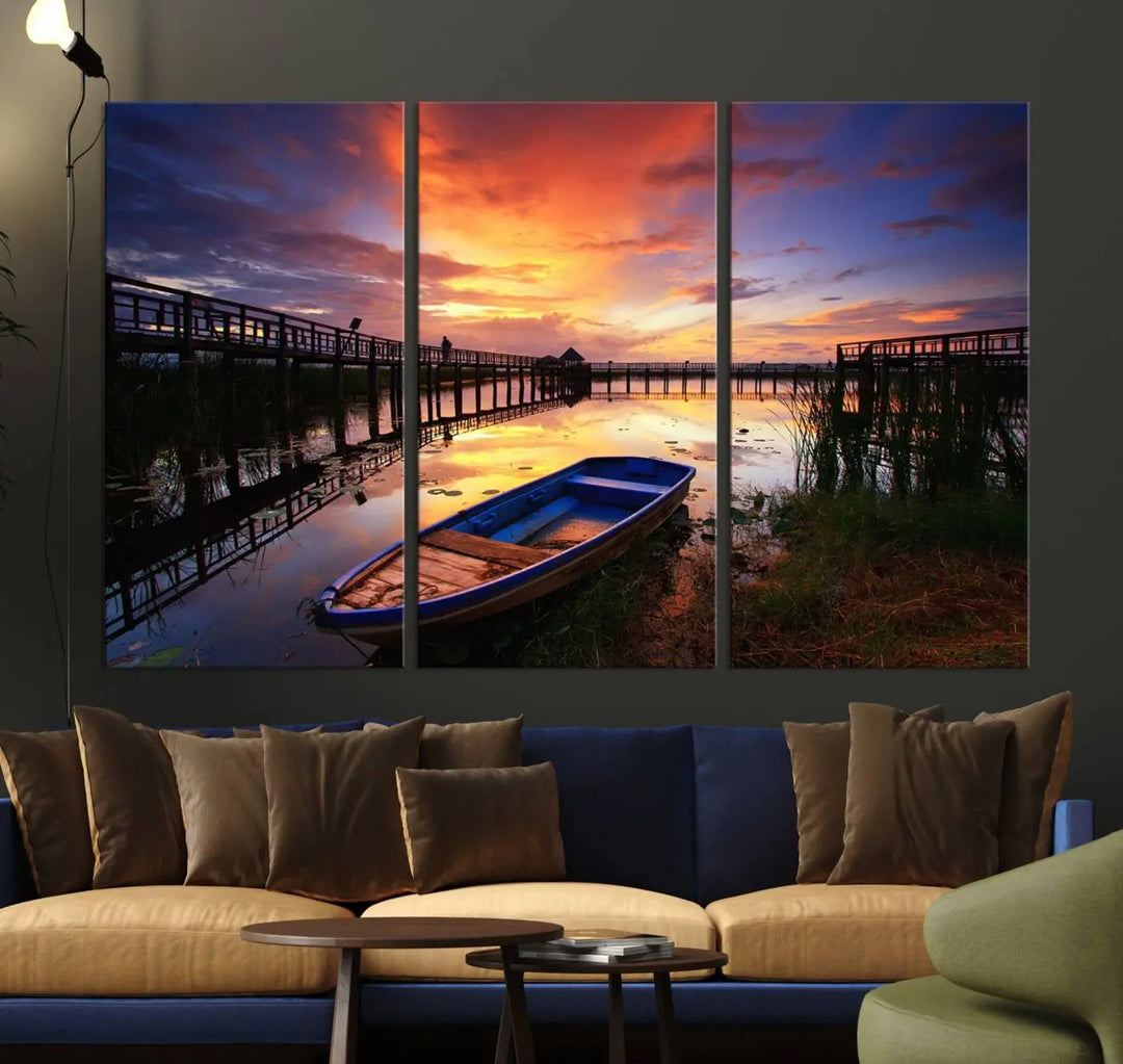 The "Sunset and Lake Landscape View Wall Art Canvas Print" showcases a tranquil sunset over a lake with a wooden dock and boat. The artwork is gallery wrapped on museum-quality canvas and features a UV-protective coating to maintain its vividness and allure.