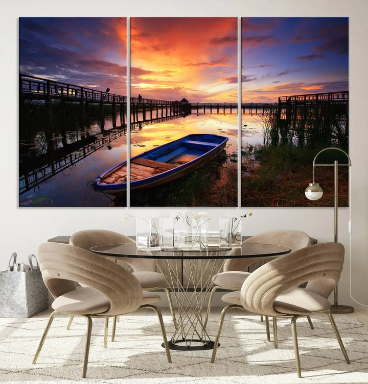 The "Sunset and Lake Landscape View Wall Art Canvas Print" showcases a tranquil sunset over a lake with a wooden dock and boat. The artwork is gallery wrapped on museum-quality canvas and features a UV-protective coating to maintain its vividness and allure.