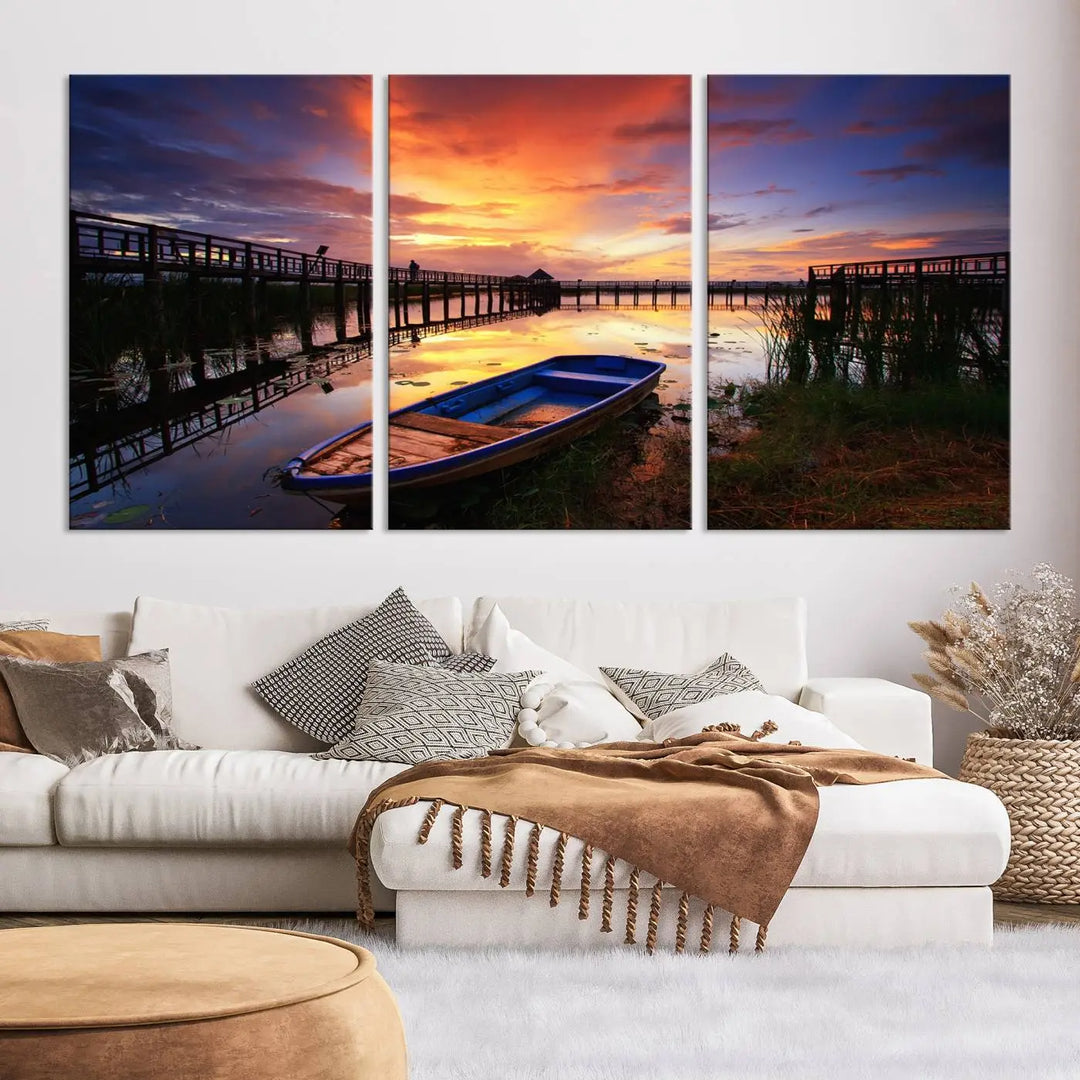 The "Sunset and Lake Landscape View Wall Art Canvas Print" showcases a tranquil sunset over a lake with a wooden dock and boat. The artwork is gallery wrapped on museum-quality canvas and features a UV-protective coating to maintain its vividness and allure.