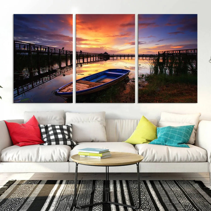 The "Sunset and Lake Landscape View Wall Art Canvas Print" showcases a tranquil sunset over a lake with a wooden dock and boat. The artwork is gallery wrapped on museum-quality canvas and features a UV-protective coating to maintain its vividness and allure.