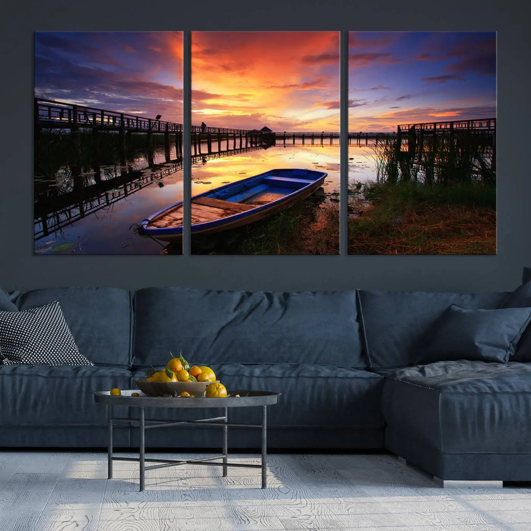 The "Sunset and Lake Landscape View Wall Art Canvas Print" showcases a tranquil sunset over a lake with a wooden dock and boat. The artwork is gallery wrapped on museum-quality canvas and features a UV-protective coating to maintain its vividness and allure.