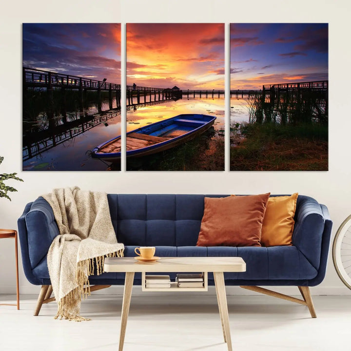 The "Sunset and Lake Landscape View Wall Art Canvas Print" showcases a tranquil sunset over a lake with a wooden dock and boat. The artwork is gallery wrapped on museum-quality canvas and features a UV-protective coating to maintain its vividness and allure.