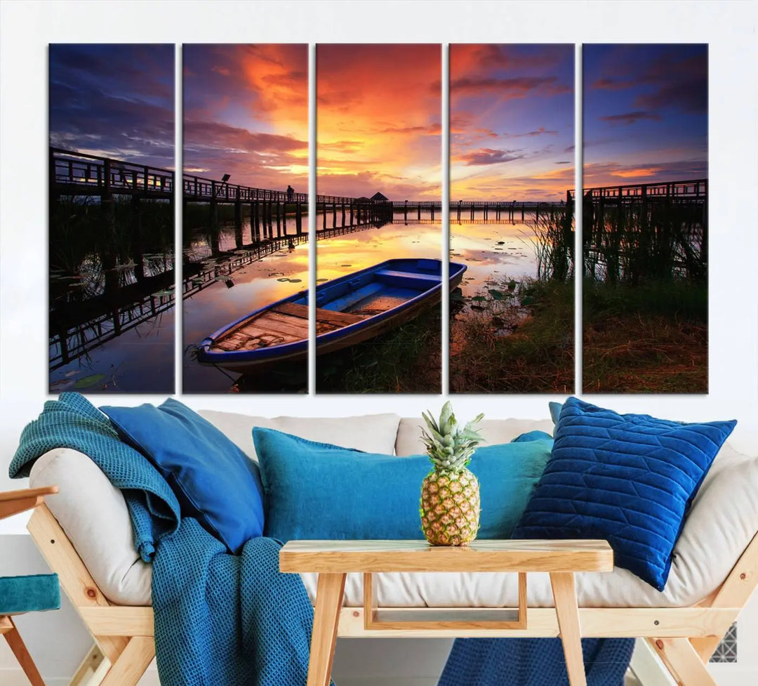 The "Sunset and Lake Landscape View Wall Art Canvas Print" showcases a tranquil sunset over a lake with a wooden dock and boat. The artwork is gallery wrapped on museum-quality canvas and features a UV-protective coating to maintain its vividness and allure.