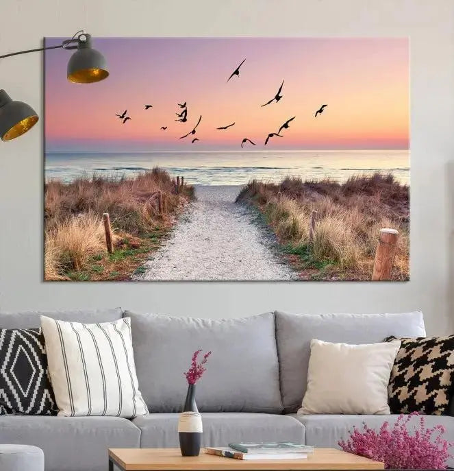 The wall art, titled "Sunset and Ocean Wall Art Canvas Print," is a museum-quality piece depicting a beach path at sunset with birds in flight.