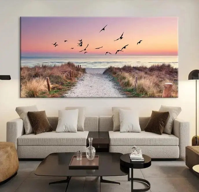 The wall art, titled "Sunset and Ocean Wall Art Canvas Print," is a museum-quality piece depicting a beach path at sunset with birds in flight.