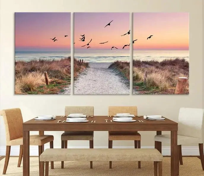 The wall art, titled "Sunset and Ocean Wall Art Canvas Print," is a museum-quality piece depicting a beach path at sunset with birds in flight.