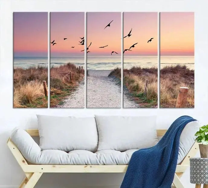 The wall art, titled "Sunset and Ocean Wall Art Canvas Print," is a museum-quality piece depicting a beach path at sunset with birds in flight.