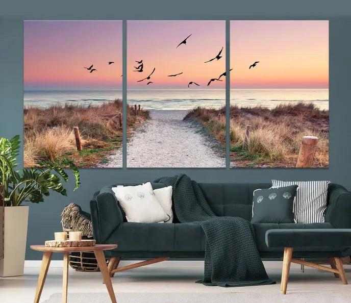 The wall art, titled "Sunset and Ocean Wall Art Canvas Print," is a museum-quality piece depicting a beach path at sunset with birds in flight.