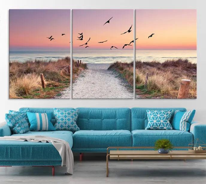 The wall art, titled "Sunset and Ocean Wall Art Canvas Print," is a museum-quality piece depicting a beach path at sunset with birds in flight.