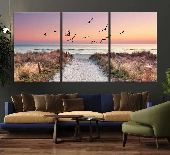 The wall art, titled "Sunset and Ocean Wall Art Canvas Print," is a museum-quality piece depicting a beach path at sunset with birds in flight.